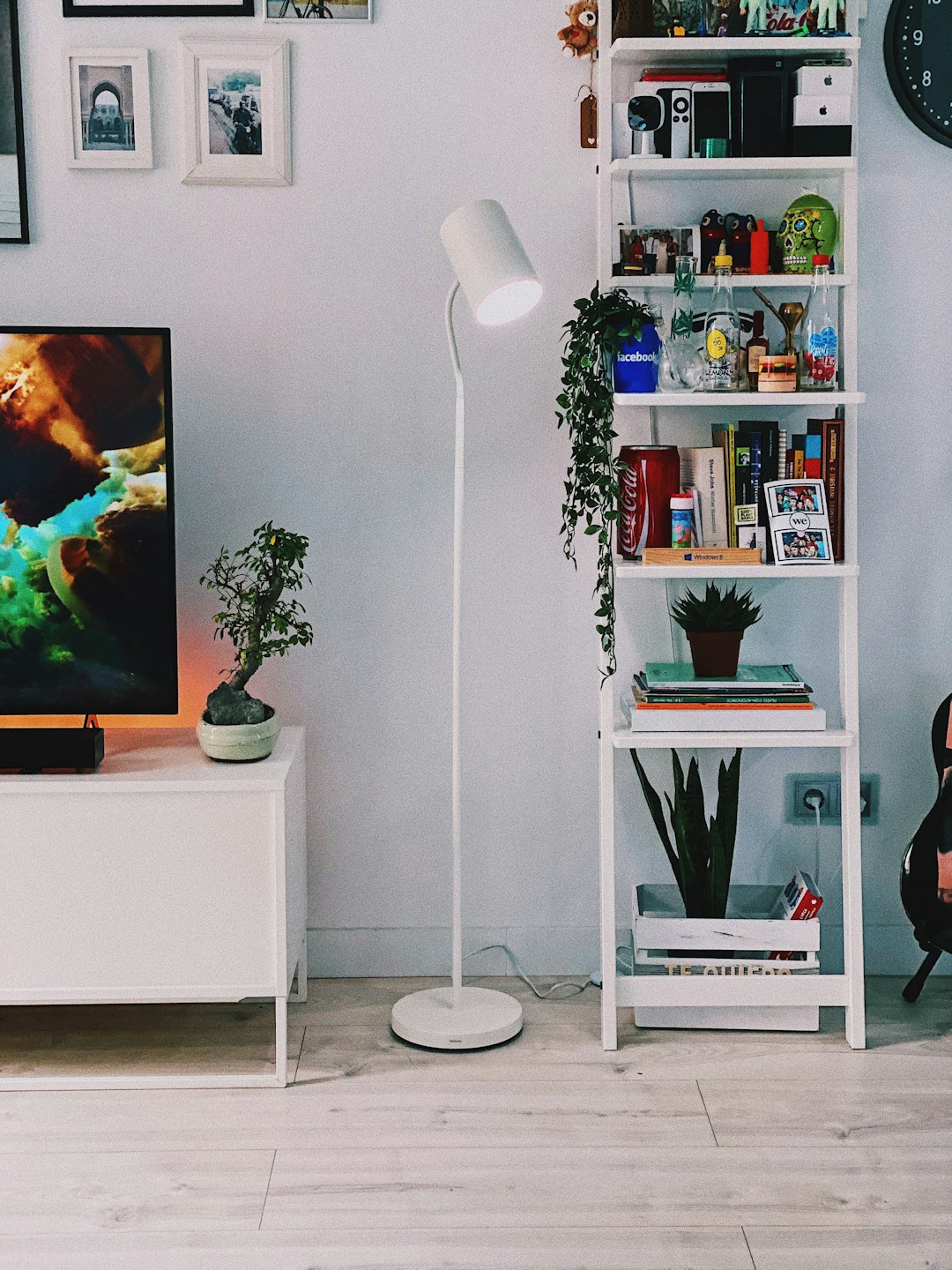 trusted-partner black-flat-screen-tv-on-white-wooden-tv-rack-2srdfv-knhm